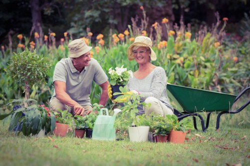 Operatives sorting garden waste at a lawn mowing site in Uxbridge